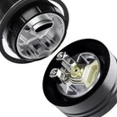 Close-up of a mechanical component with black and silver design on a white background